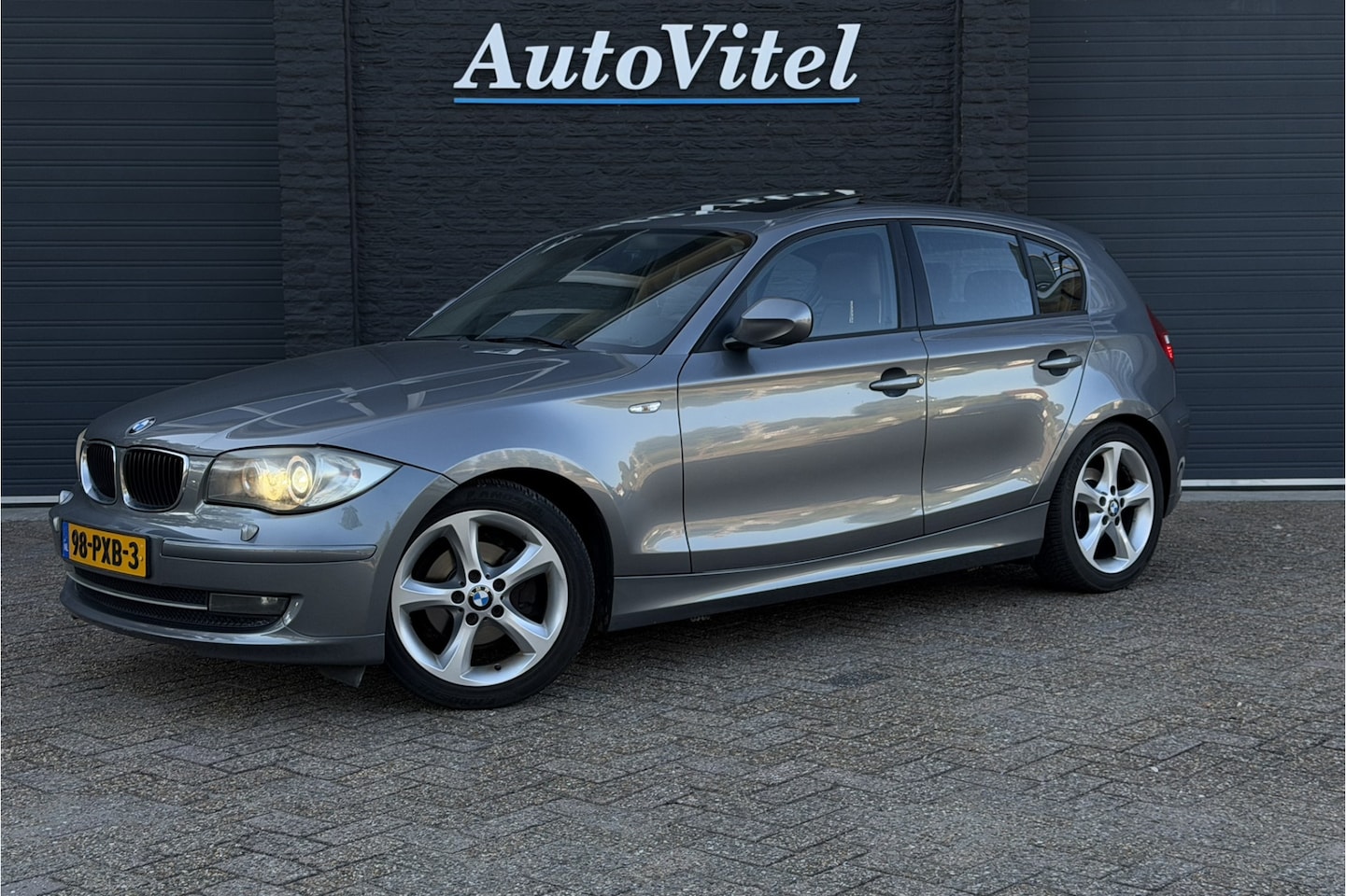 BMW 1-serie - 116i EffDyn. | Panodak | Sportleder | Stoelverwarming | PDC A | Clima - AutoWereld.nl