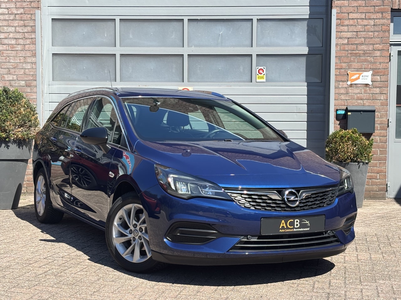 Opel Astra Sports Tourer - 1.2 Business Elegance Dealer onderhouden! - AutoWereld.nl