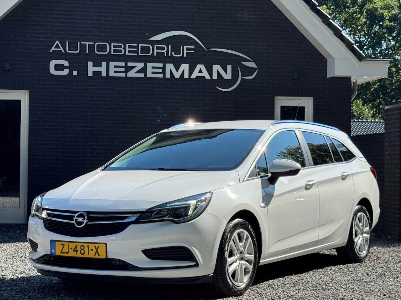 Opel Astra Sports Tourer - 1.0 Turbo Business 2019 Navigatie Cruise Climate Control LED Camera APPLE CARPLAY - AutoWereld.nl