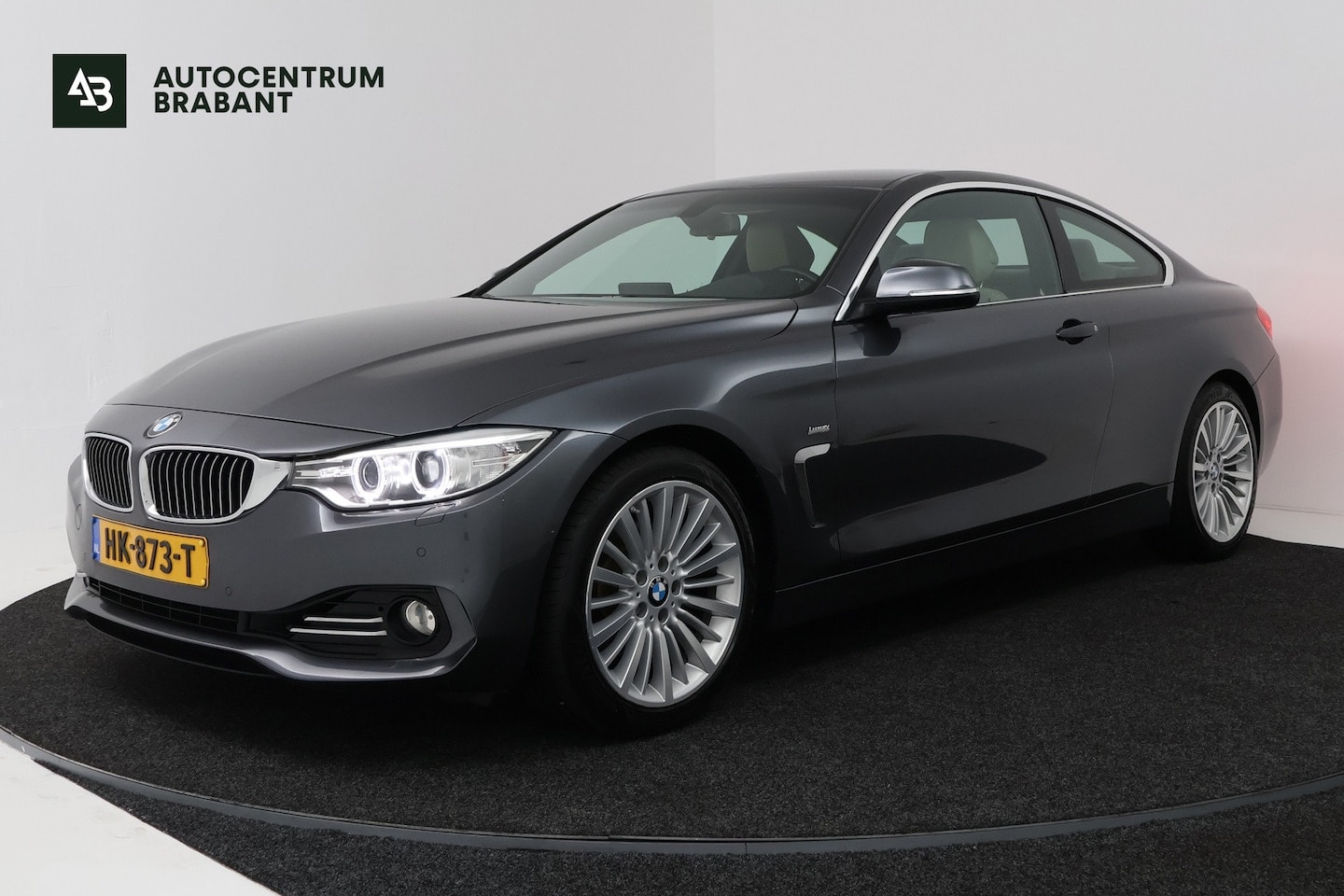 BMW 4-serie Coupé - 420i Luxury (GROOT-NAVIGATIE, SPORTSTOELEN, STOELVERWARMING, PDC, DEALER ONDERHOUDEN) - AutoWereld.nl
