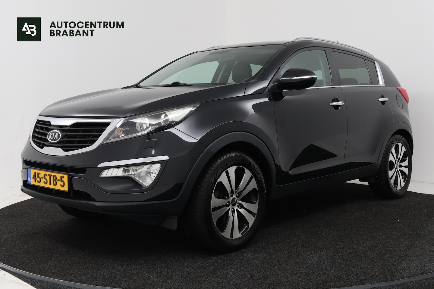 Kia Sportage - 2.0 X-clusive (TREKHAAK, STOELVERWARMING, CAMERA, NAVIGATIE, LED) - AutoWereld.nl