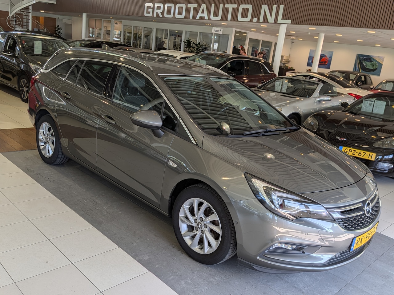 Opel Astra Sports Tourer - 1.0 Innovation Airco, Cruise Control, Trekhaak, Stuurbekrachtiging - AutoWereld.nl