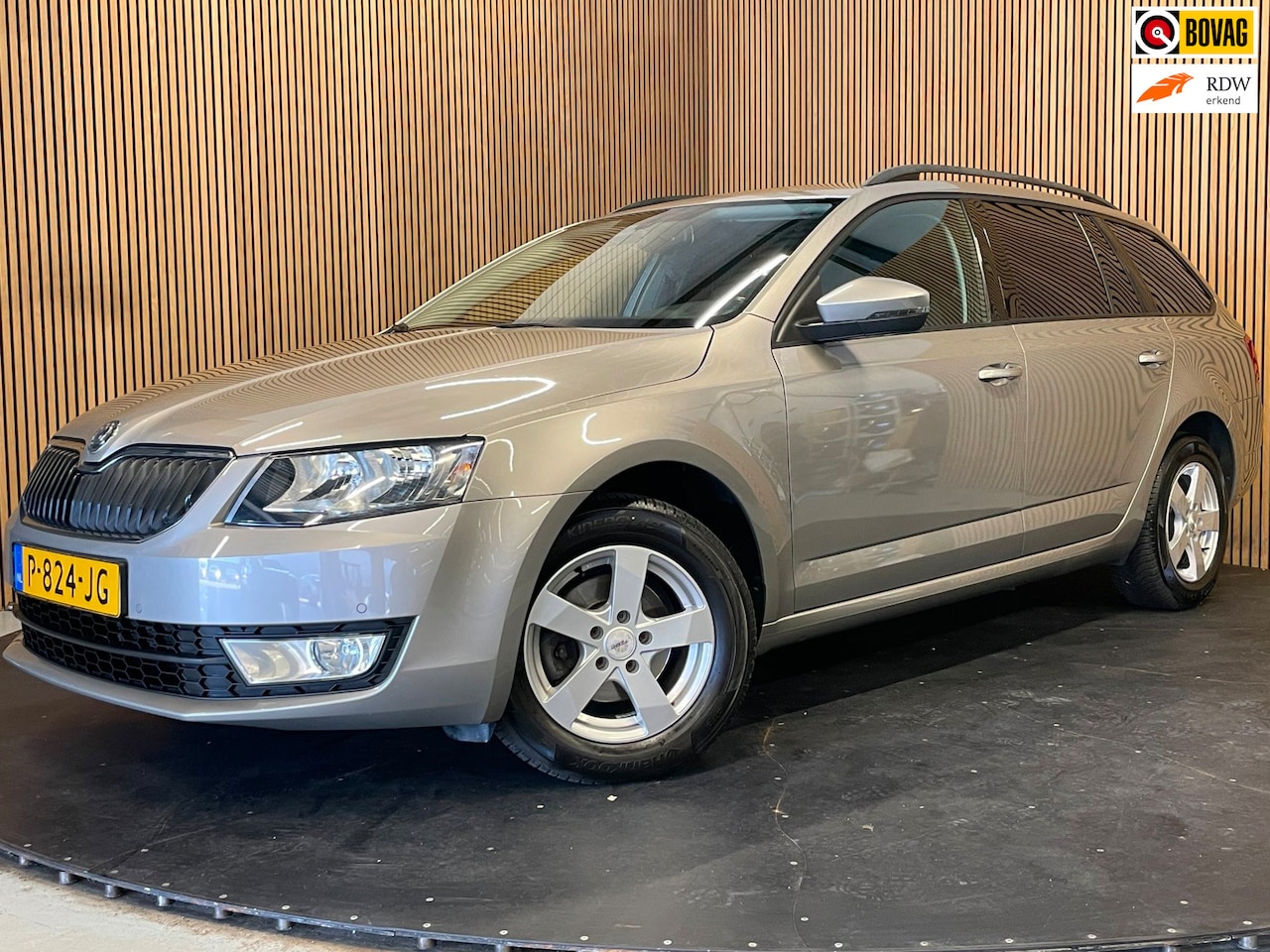 Skoda Octavia Combi - 1.2 TSI|NAVIGATIE|CRUISE+CLIMATE CONTROL|MF-STUUR|STOELVERWARMING|START/STOP|ELEK. SPIEGEL - AutoWereld.nl