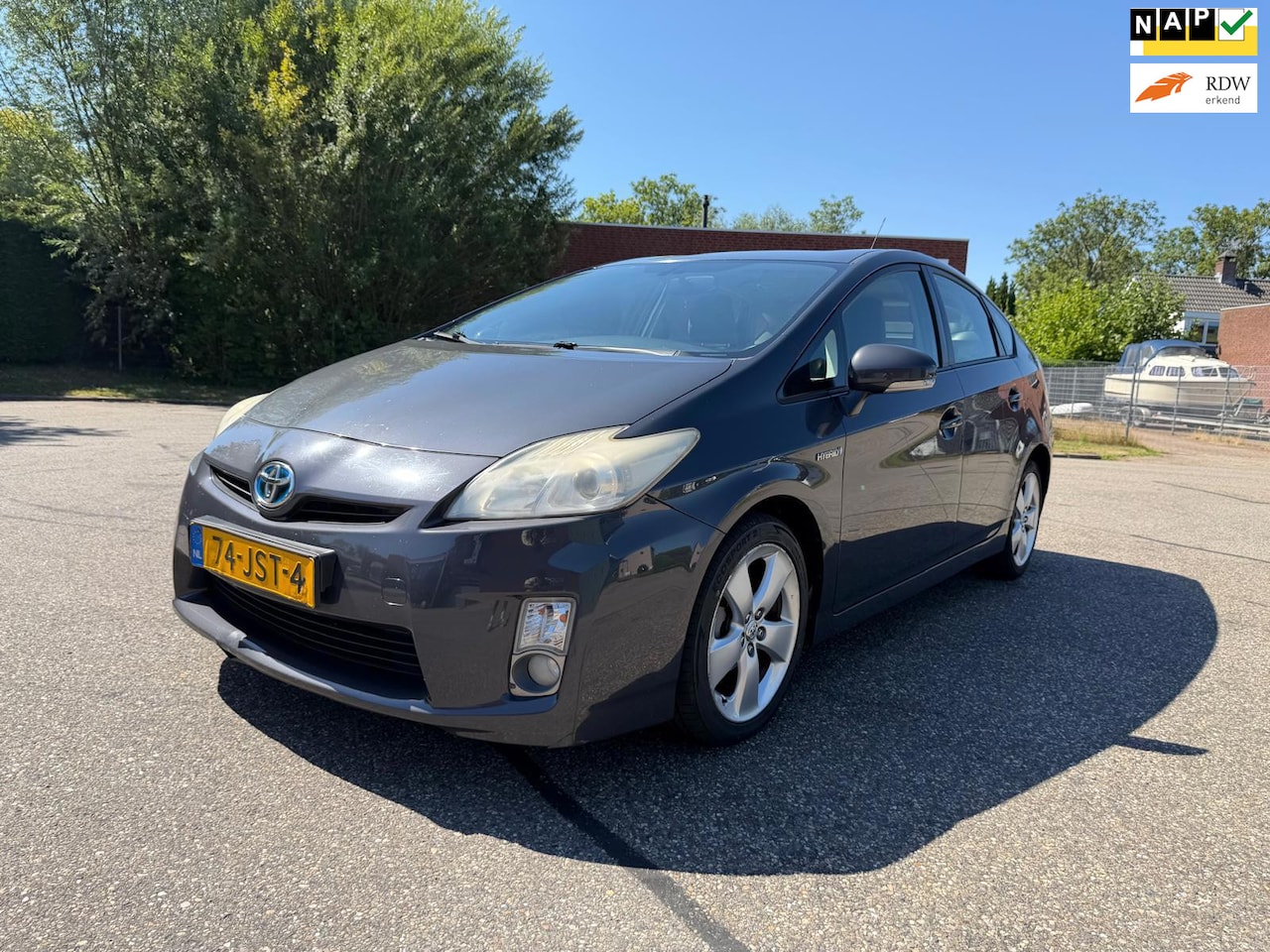 Toyota Prius - 1.8 Aspiration AUTOMAAT*Airco*Cruise*LM Velgen* Dealer onderhouden - AutoWereld.nl