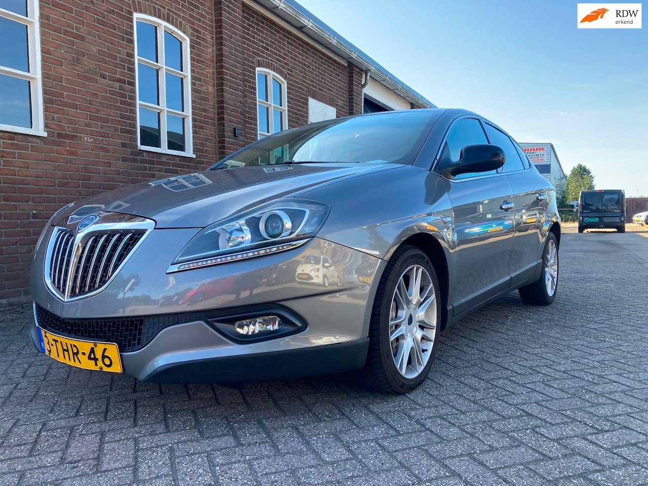 Lancia Delta - 1.8-16V Di Oro Bj 2010, Xenon, Clima, Cruise , PDC inruil is mogelijk - AutoWereld.nl