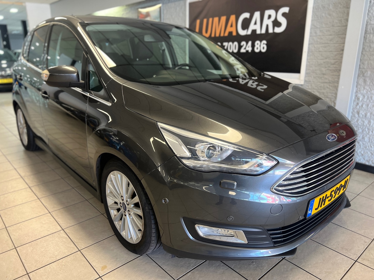 Ford C-Max - 1.0 Titanium | Nieuwe APK | Camera | Navi | PDC | - AutoWereld.nl