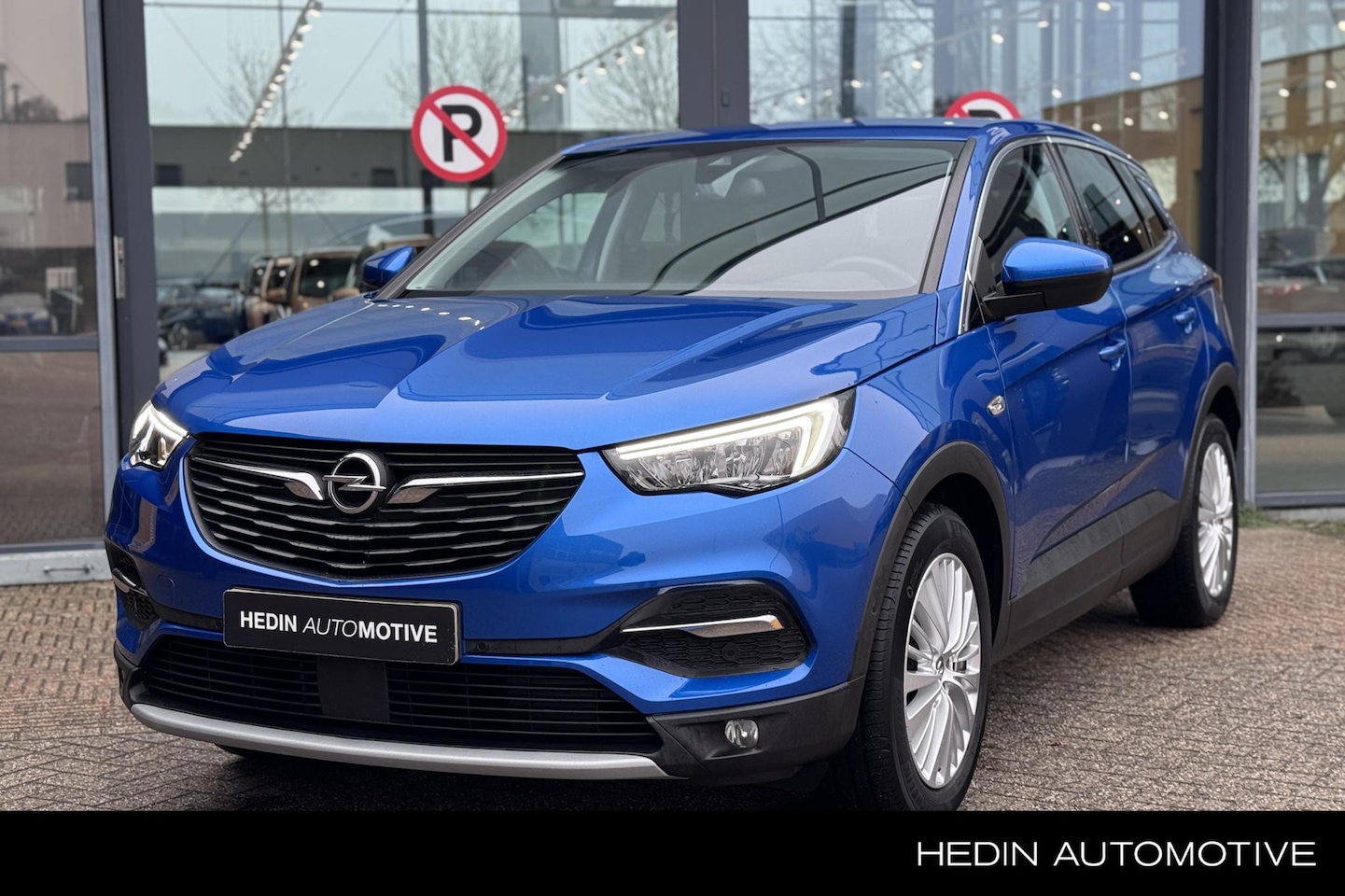 Opel Grandland X - 1.2 130PK Turbo Innovation | 32.000km! | Navigatie | Camera | Climate Control | Comfortsto - AutoWereld.nl