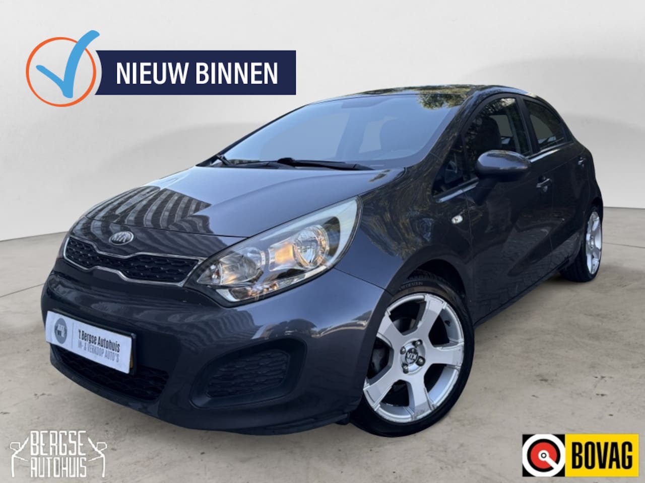 Kia Rio - 1.2 CVVT Comf. Pack Airco Navi Lmv BT Nap - AutoWereld.nl