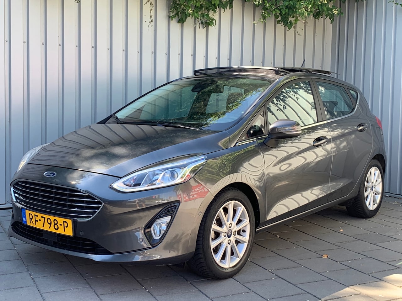 Ford Fiesta - 1.0 EcoBoost Titanium|Opendak|Navigatie|Climate Control| - AutoWereld.nl