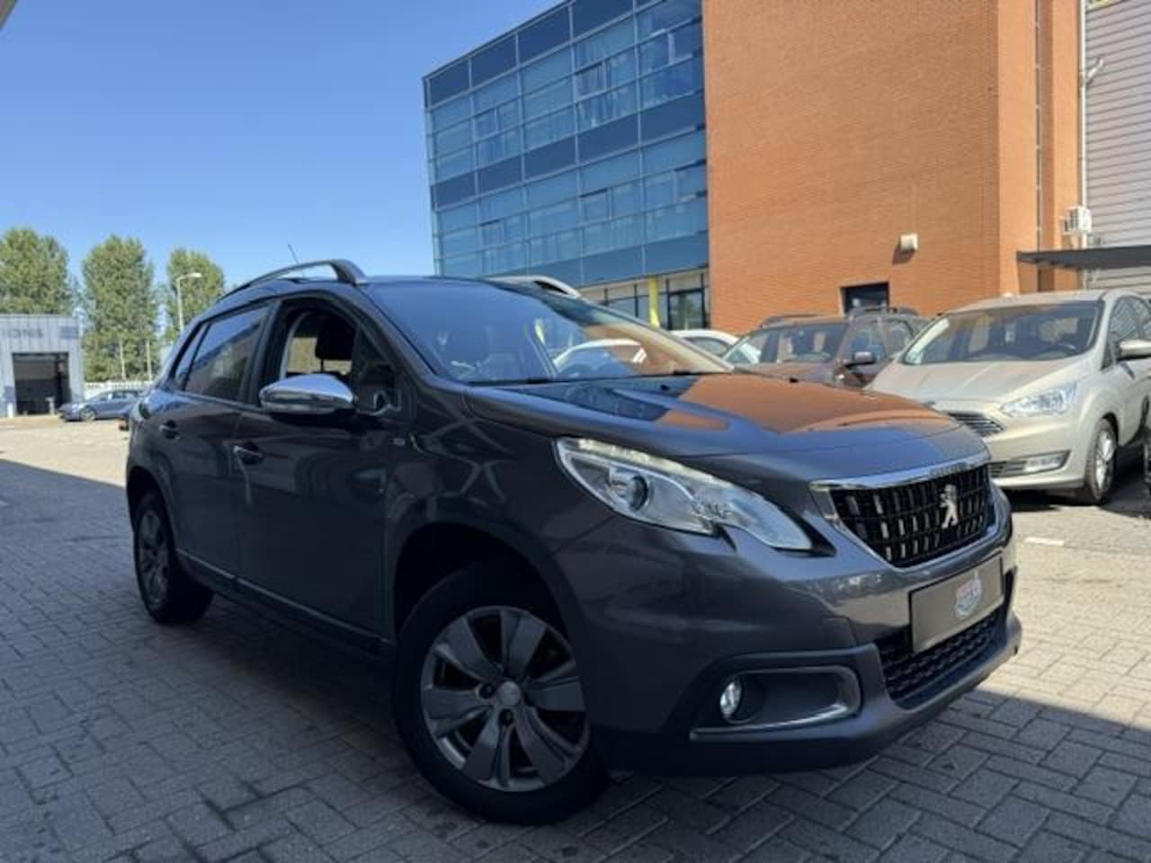 Peugeot 2008 - 1.2 Benzine Style | Cruise Control | Navigatie - AutoWereld.nl