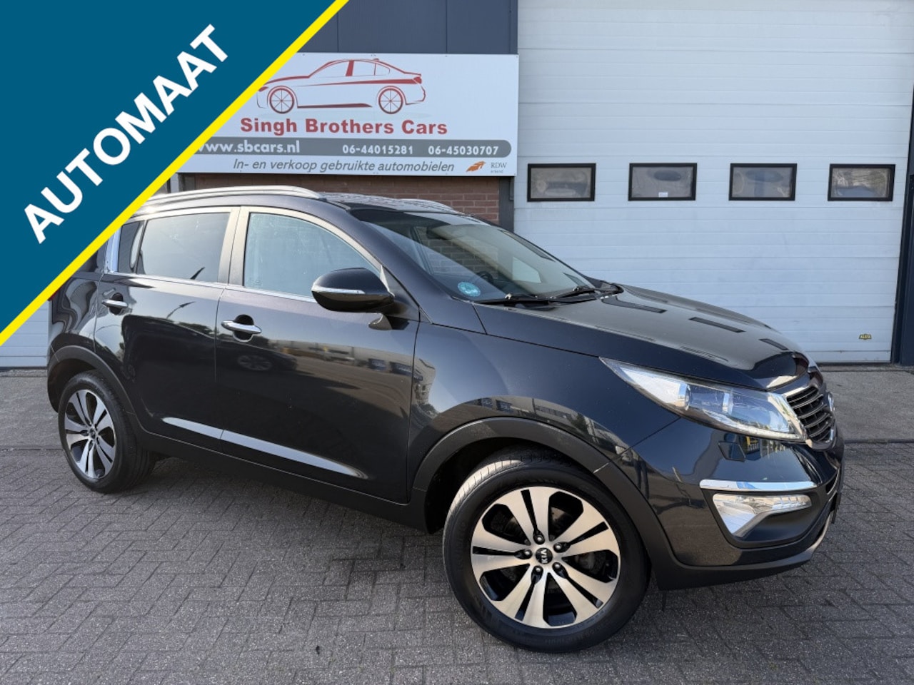 Kia Sportage - 2.0 X-clusive First/AUT/LEER/NAVI/NAP/KEYLEES !!!! - AutoWereld.nl