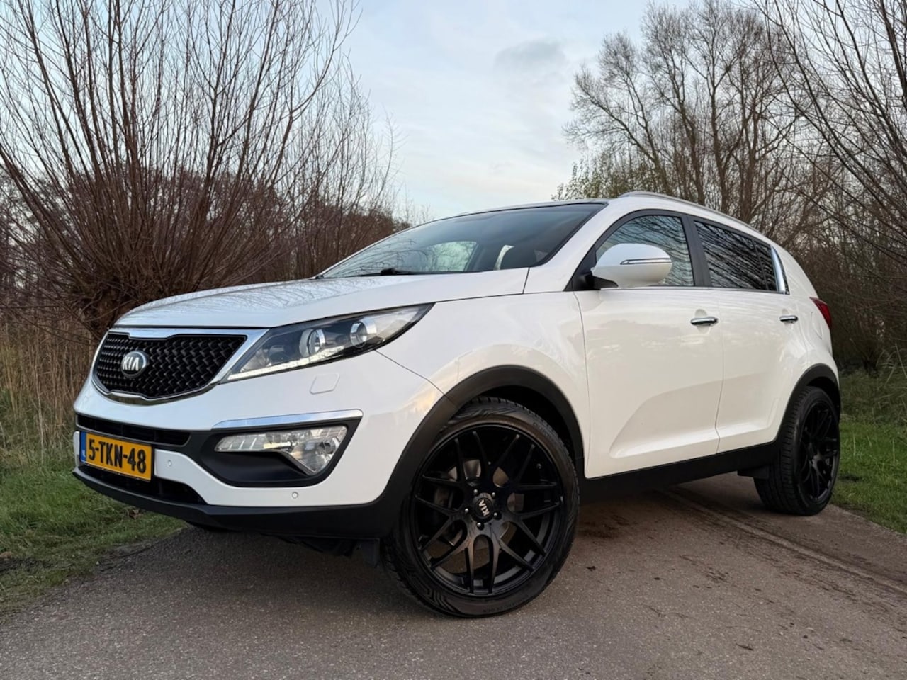 Kia Sportage - 1.6 GDI ExecutiveLine | Schuifdak | Leder | Stoelverwarming | Camera | Navi | - AutoWereld.nl