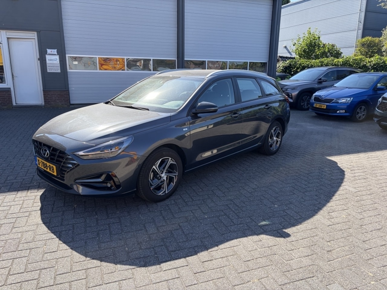 Hyundai i30 Wagon - 1.0 T-GDi MHEV ComSm met trekhaak - AutoWereld.nl