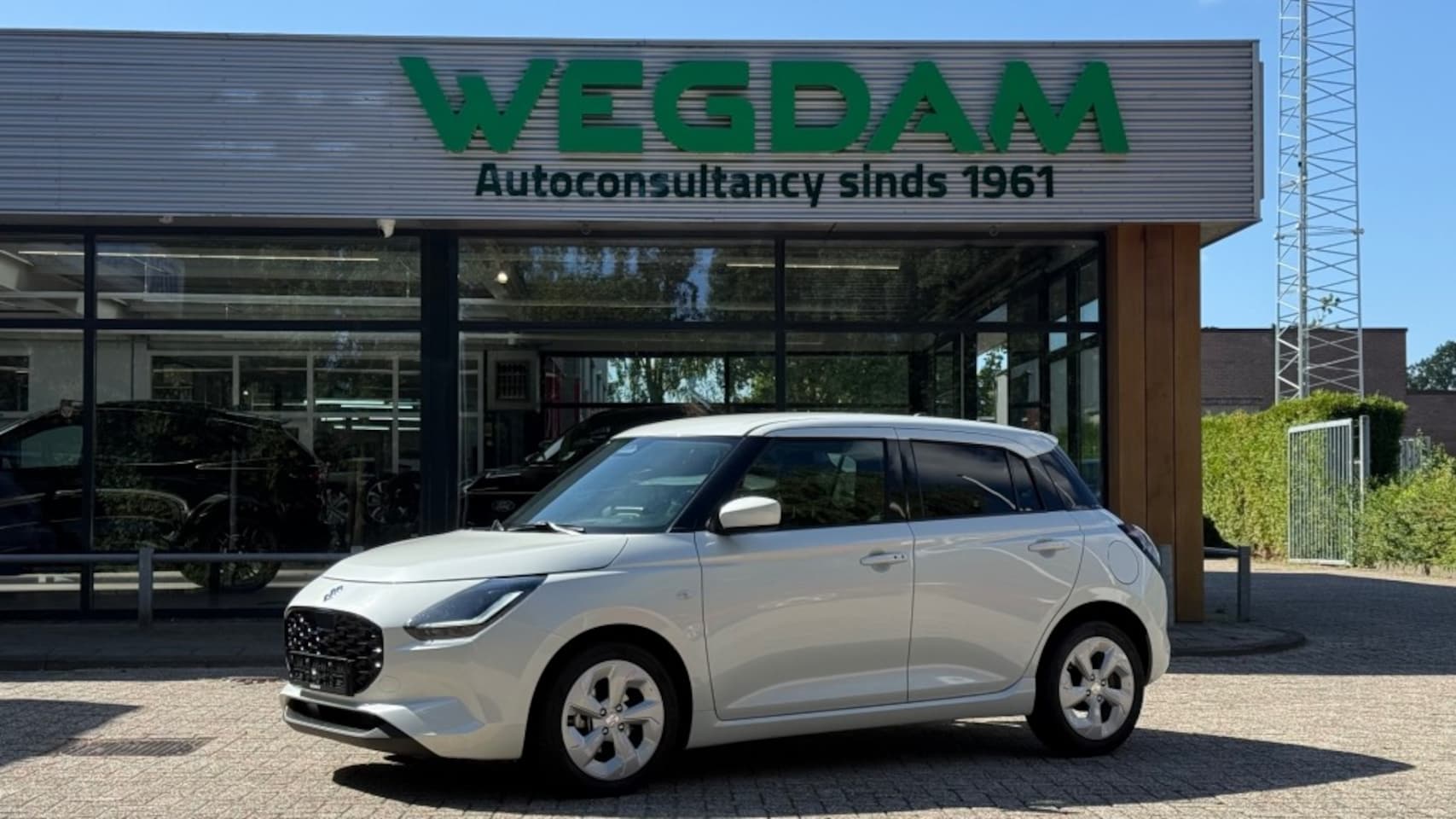 Suzuki Swift - 1.2 SELECT SMARTHYB. AUT All-weather band - AutoWereld.nl