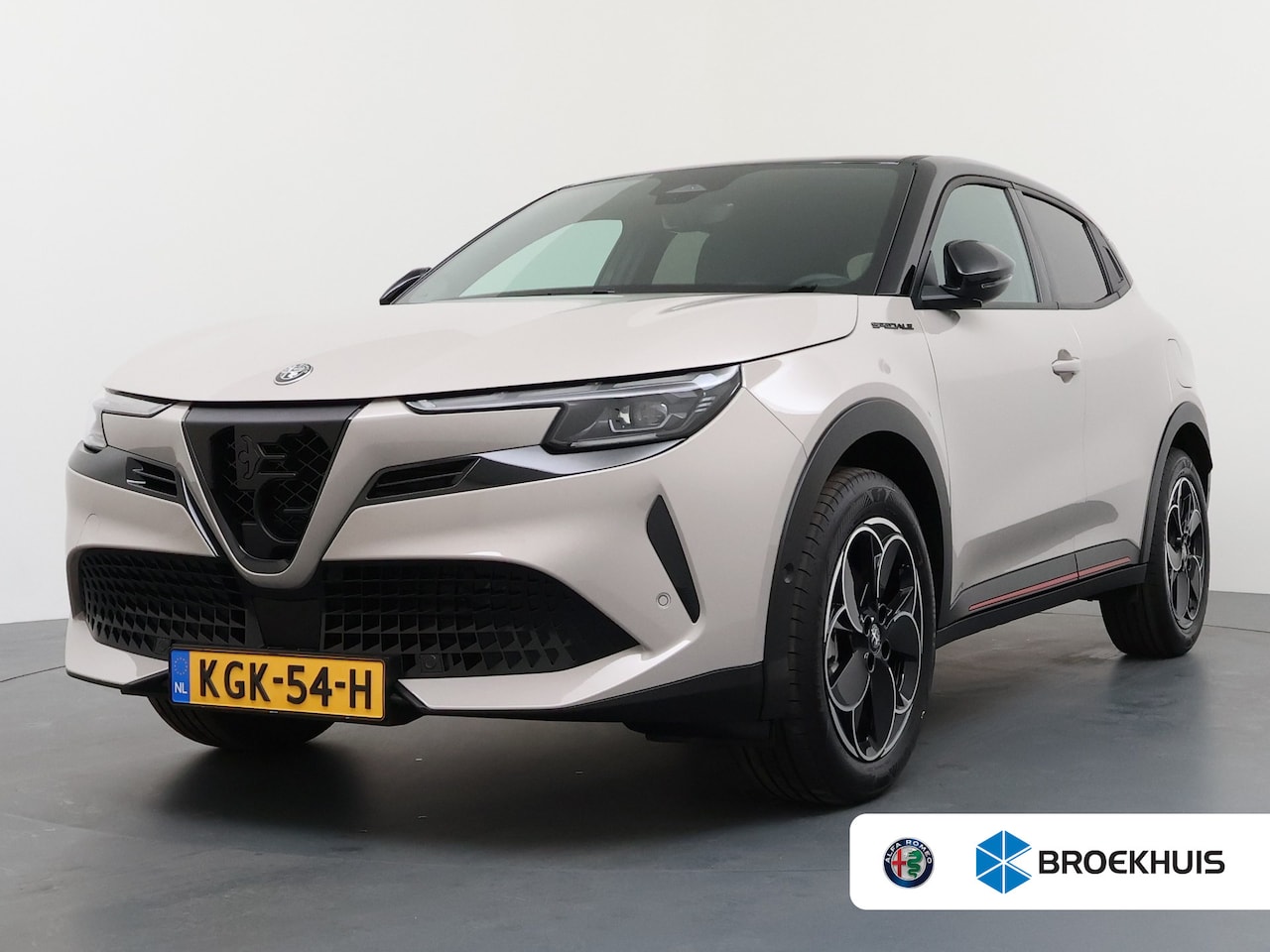 Alfa Romeo Junior - Elettrica Speciale | "Spiga" Stoffen/ecoleder bekleding met rode accenten - 6-voudig verst - AutoWereld.nl