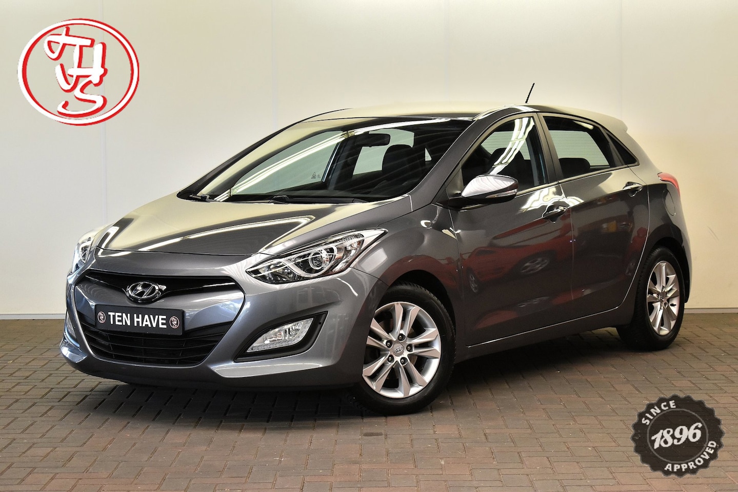 Hyundai i30 - 1.4 ELEK. STOEL|CLIMATE CONTROL|CRUISE CONTROL|STOELVERWARMIN|ALL-SEASON - AutoWereld.nl