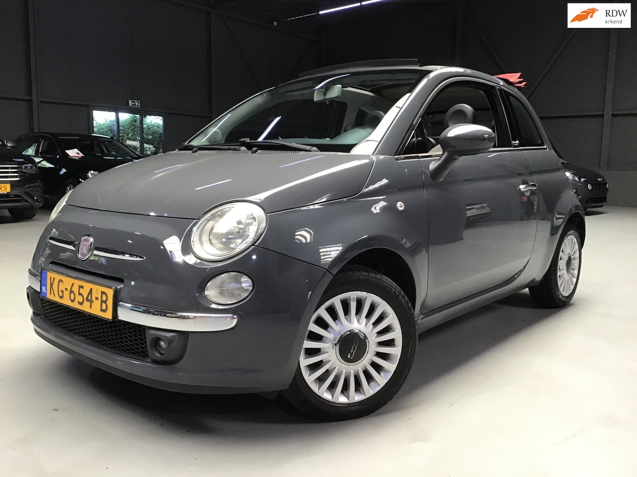 Fiat 500 C - 1.2 Lounge I Airco I Park. sens I Touch Scherm I Half leder I Carkit I 15 inch LMV I Mistl - AutoWereld.nl