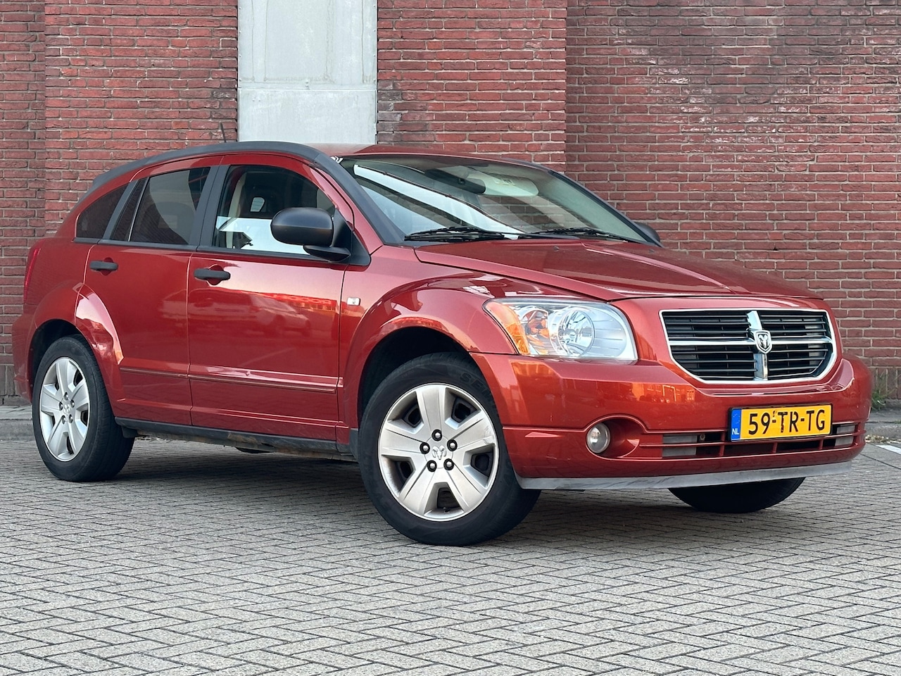 Dodge Caliber - 2.0 SXT|AUTOMAAT|AIRCO|CRUISE|INRUILKOOPJE - AutoWereld.nl