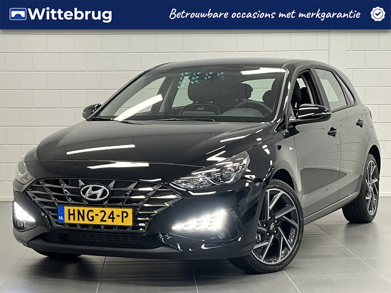 Hyundai i30 - 1.0 T-GDi MHEV Comfort N-Style AUTOMAAT | LEDER | 18 INCH VELGEN | APPLE / ANDROID NAVIGAT - AutoWereld.nl