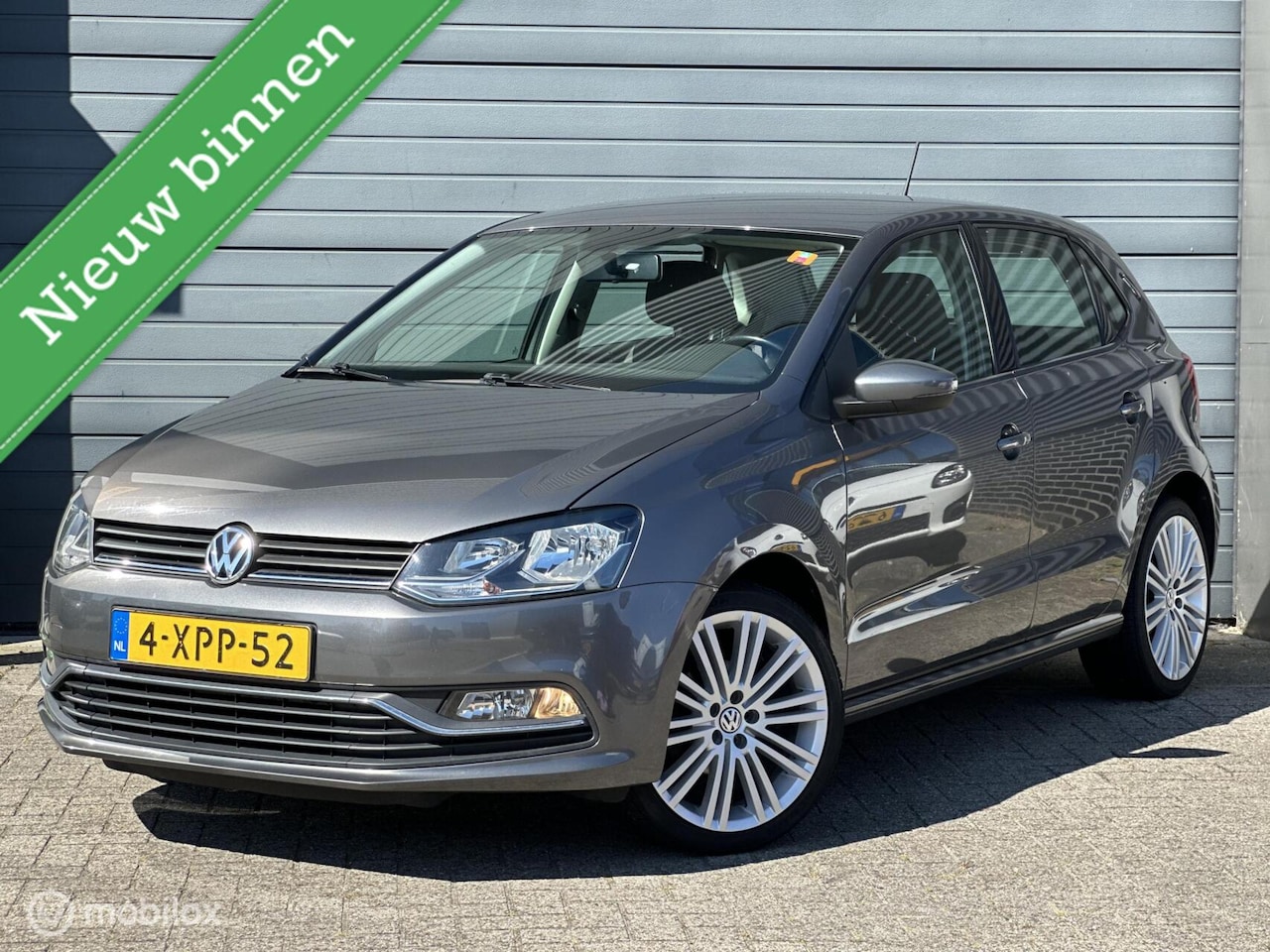 Volkswagen Polo - 1.2 TSI Highline | Facelift | Airco - AutoWereld.nl