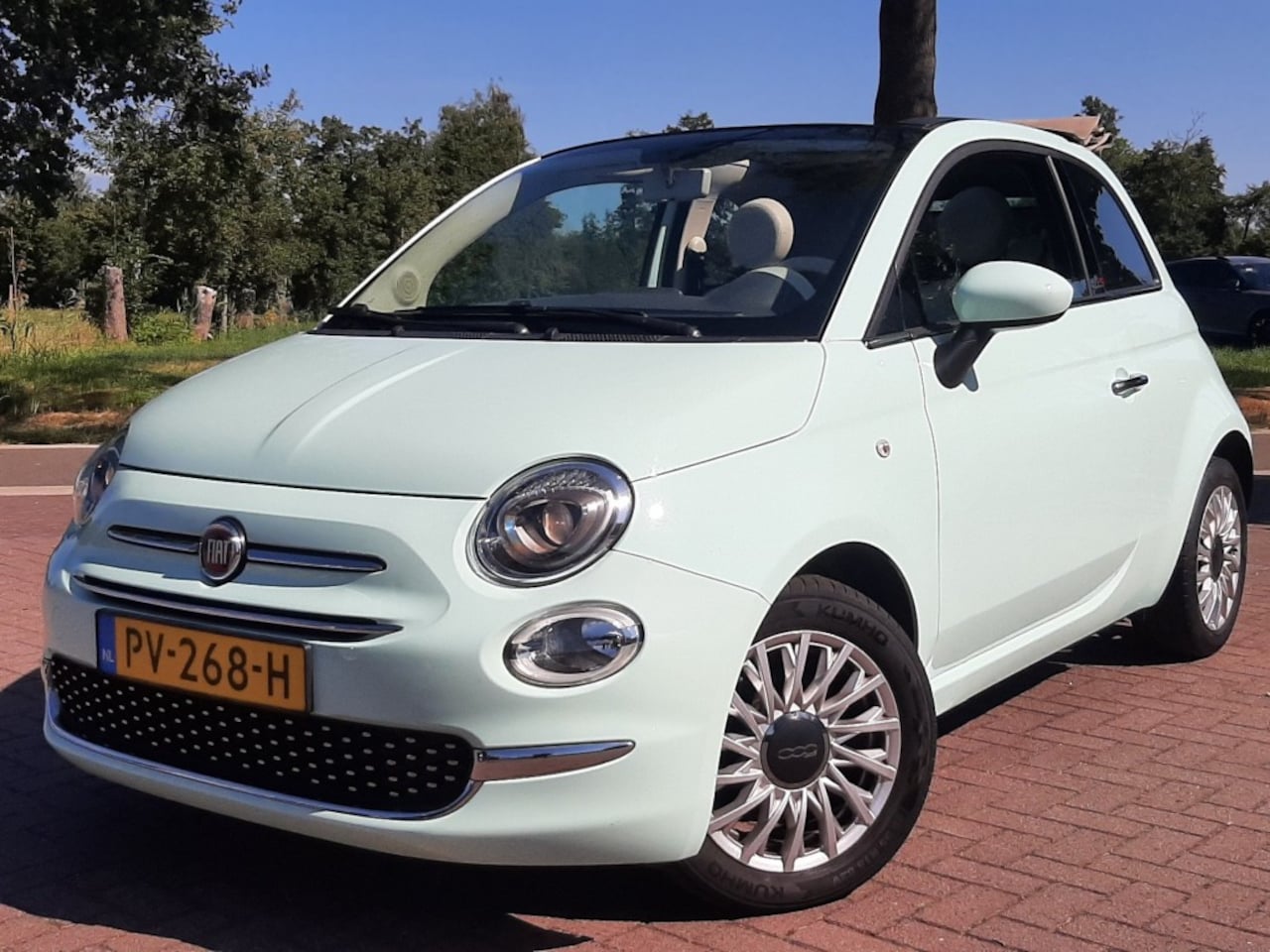 Fiat 500 - C 0.9 80pk Twin-Air Airco Cruise-control Bluetooth Open-dak - AutoWereld.nl