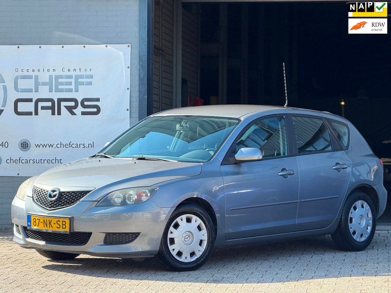 Mazda 3 Sport - 1.6|NAP|APK|AIRCO|PDC|5D|NIEUWEBEURT|3EIGENAAR! - AutoWereld.nl