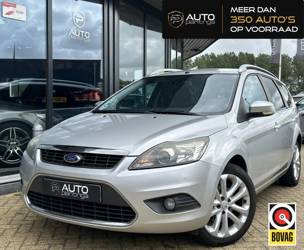 Ford Focus Wagon - 1.6 Titanium 101PK | NL AUTO | Trekhaak | Parkeersensoren | Spoiler | Lichtmetalen Velgen - AutoWereld.nl