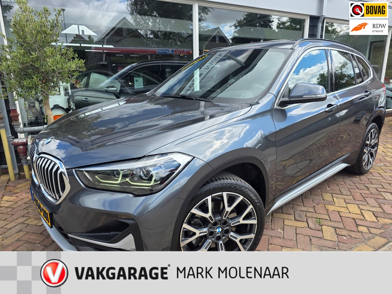 BMW X1 - SDrive20i VDL Nedcar Edition,panaorama,leder,led,trekhaak - AutoWereld.nl