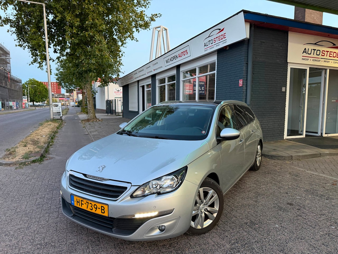Peugeot 308 SW - 1.2 PureTech Blue Lease Executive AIRCO NAVI - AutoWereld.nl