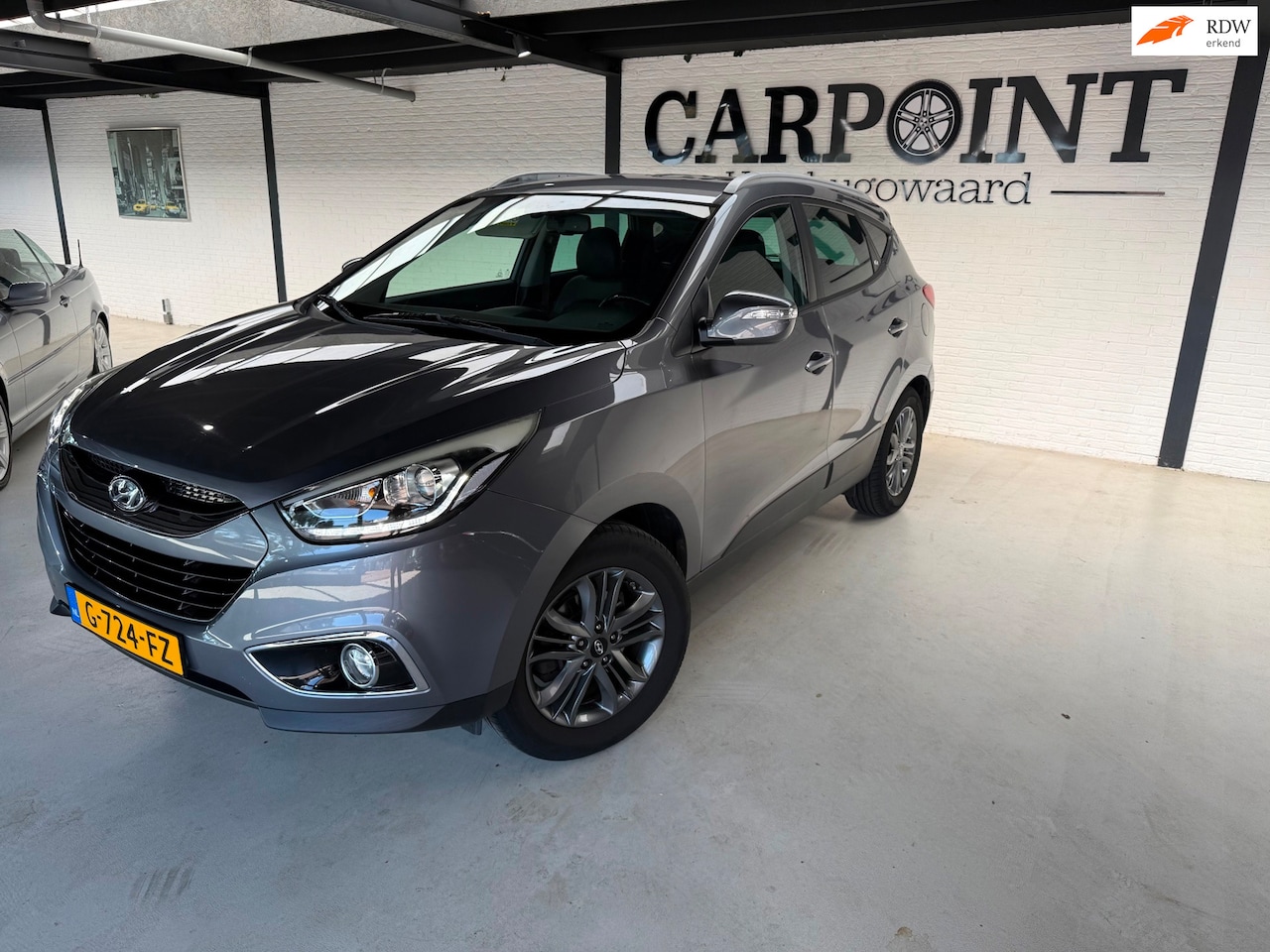 Hyundai ix35 - 1.6i GDI i-Vision 2014 Camera Clima Cruise Half lederen bekleding Nette Auto - AutoWereld.nl