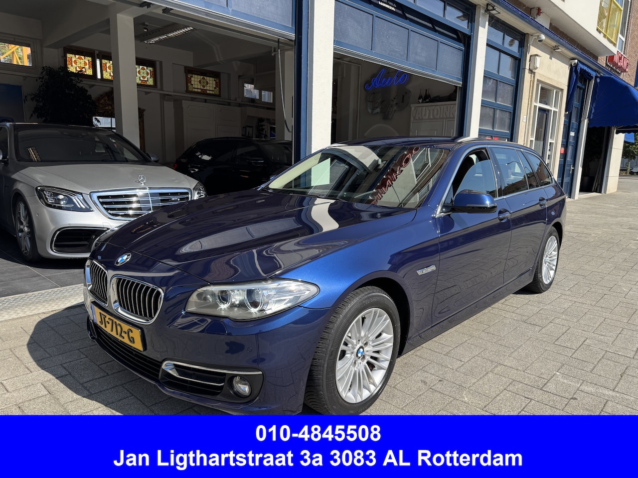 BMW 5-serie Touring - 520i High Luxury Edition NL AUTO/NIEUWSTAAT - AutoWereld.nl