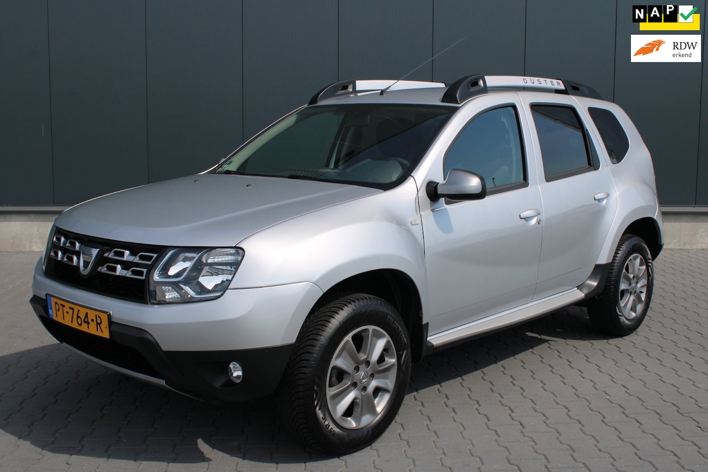 Dacia Duster - 1.2 TCe 4x2 Lauréate LPG G3 TREKHAAK AIRCO - AutoWereld.nl