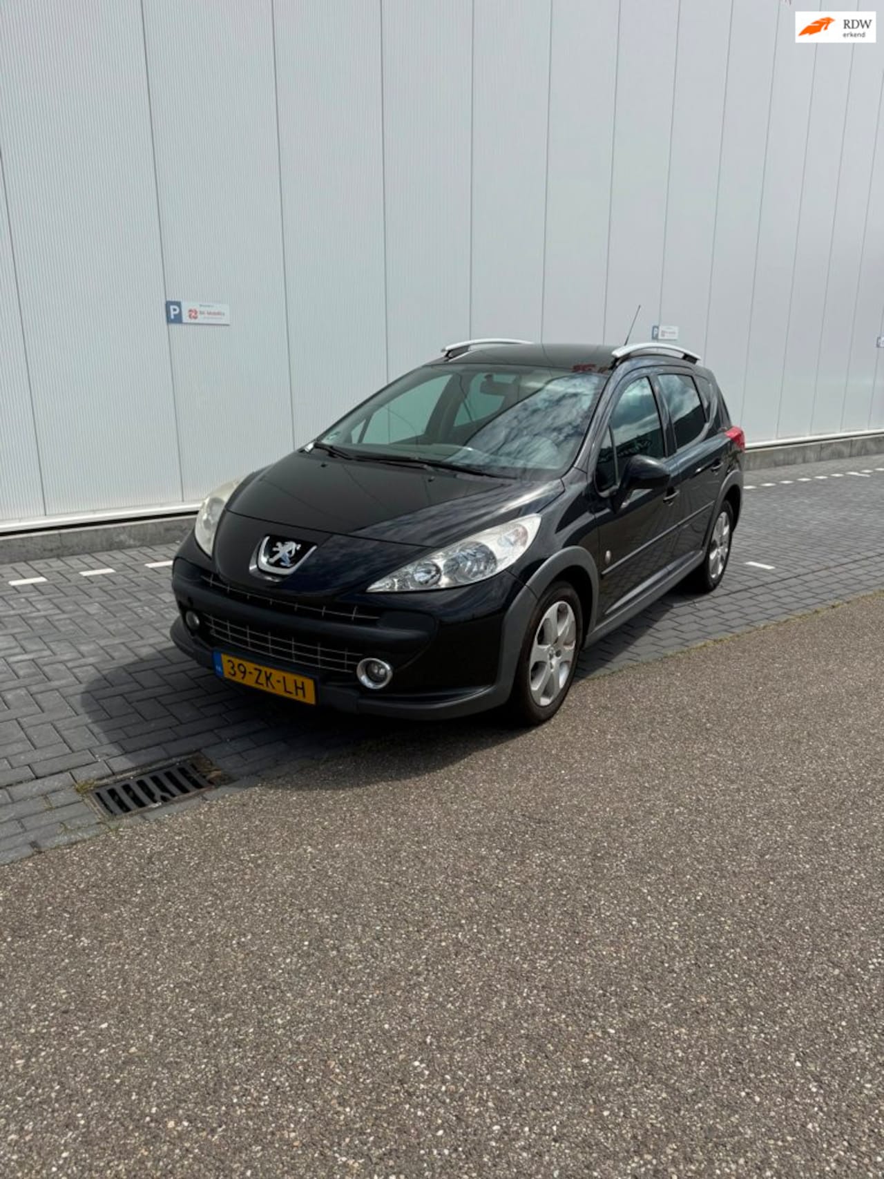 Peugeot 207 SW Outdoor - 1.6 VTi XS 1.6 VTi XS - AutoWereld.nl