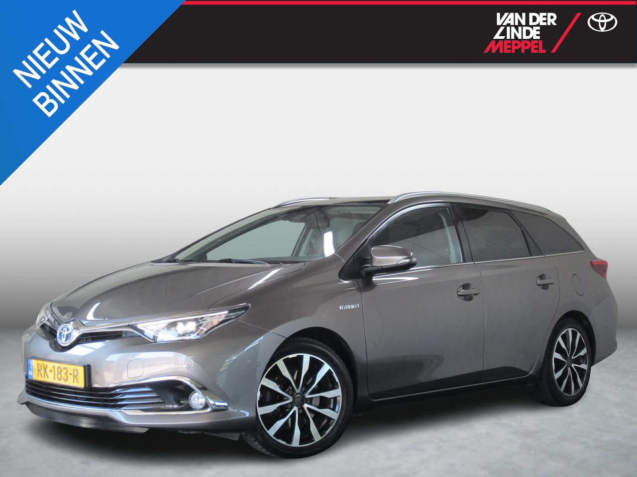 Toyota Auris Touring Sports - 1.8 Hybrid Executive Trekhaak Panoramadak - AutoWereld.nl