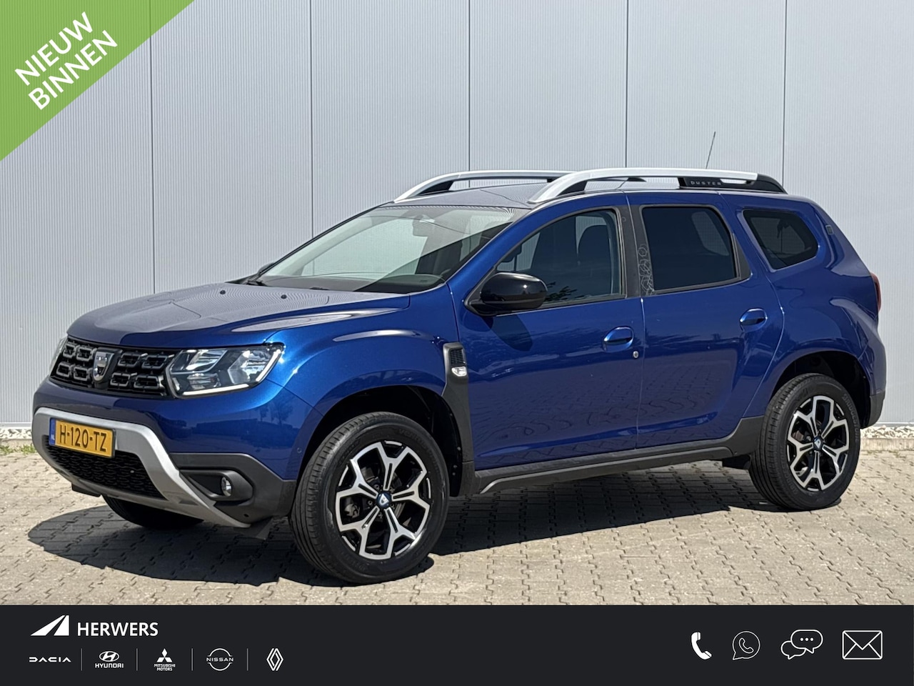 Dacia Duster - 1.0 TCe Bi-Fuel Serie Limitee 15th Anniversary / Navigatie / Airco / Cruise Control / Appl - AutoWereld.nl