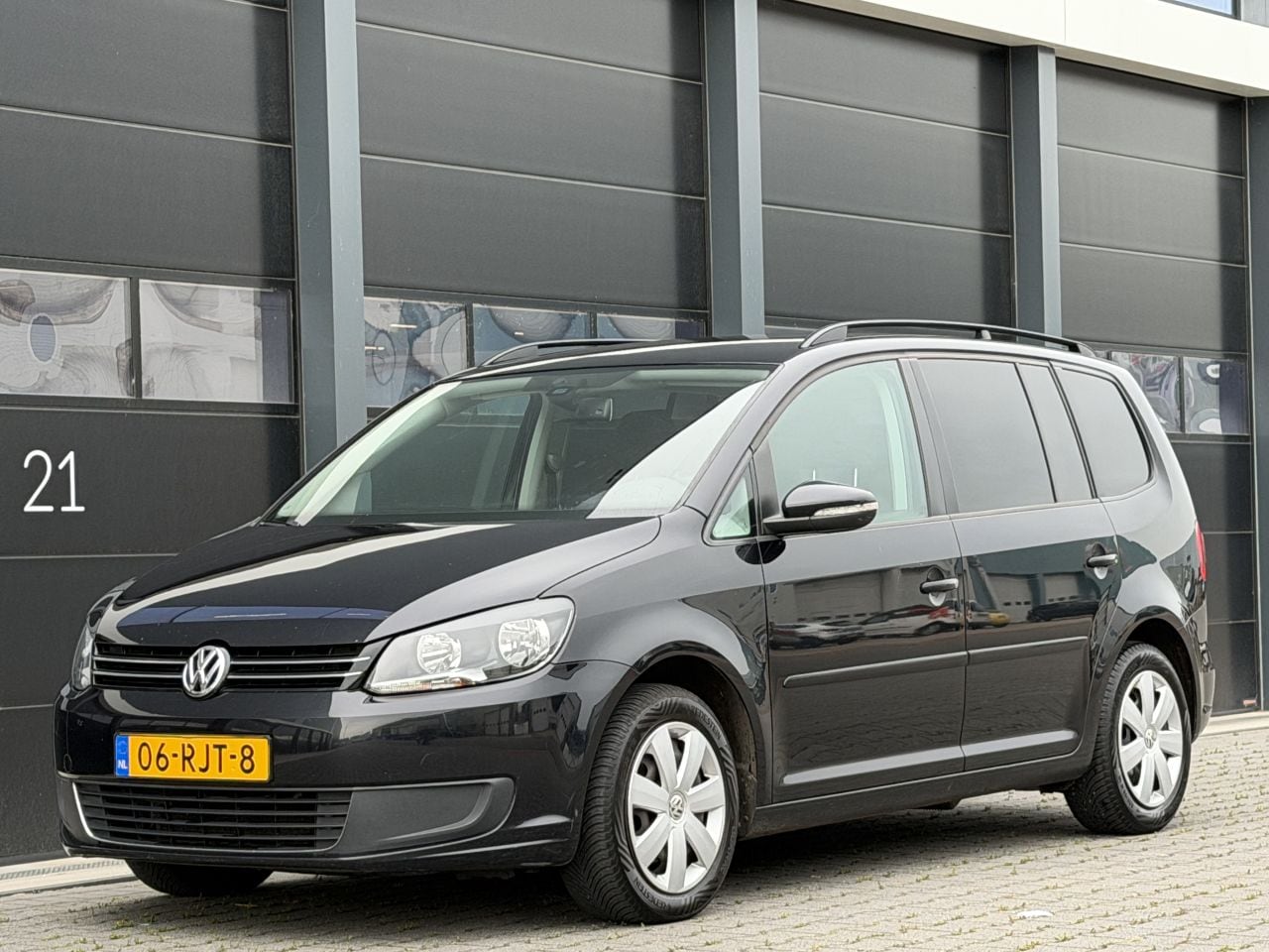 Volkswagen Touran - 1.6 TDI Navi Clima 7-PERS - AutoWereld.nl