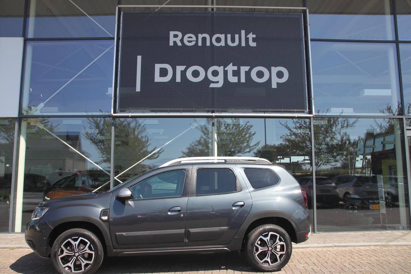 Dacia Duster - 1.3 TCe 130 PK 4x2 Comfort Luxe, Trekhaak, Navi, Sensoren - AutoWereld.nl
