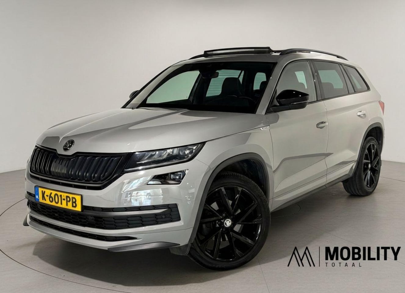 Skoda Kodiaq - 1.5 TSI 150pk DSG Sportline|Panodak|Trekhaak|NL-Auto|20 inch|Canton|Camera|Memory|Carplay| - AutoWereld.nl