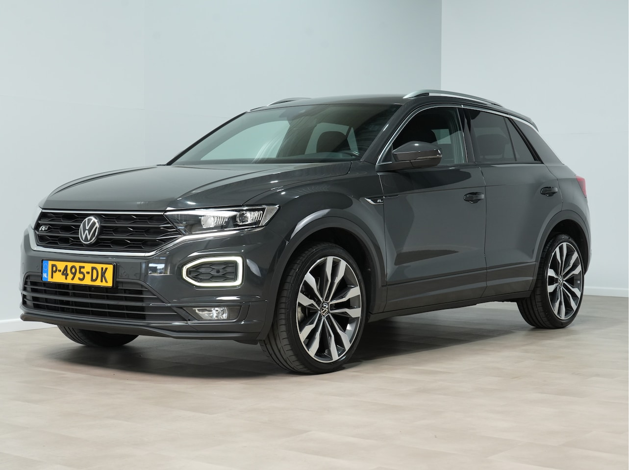 Volkswagen T-Roc - 1.5 TSI Sport Business R Navi via App Camera Clima Acc 120 - AutoWereld.nl