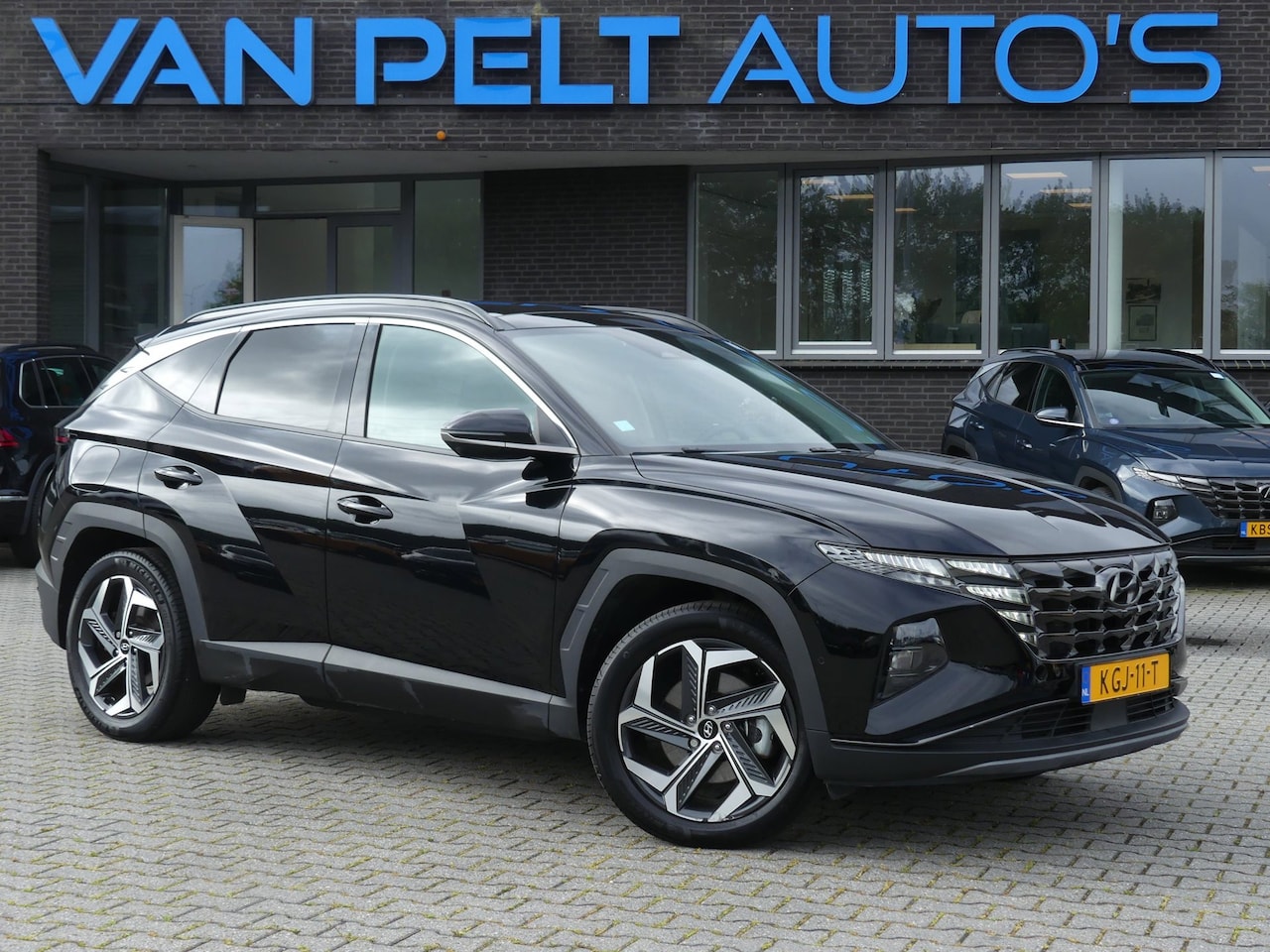 Hyundai Tucson - 1.6 T-GDI PHEV Premium Sky 4WD 1.6 T-GDI PHEV Premium Sky 4WD / PANO / LEDER / - AutoWereld.nl