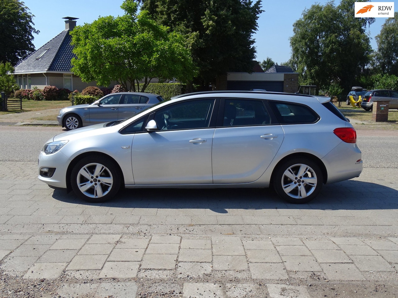 Opel Astra Sports Tourer - 1.4 Turbo Cosmo 1.4 Turbo Cosmo - AutoWereld.nl