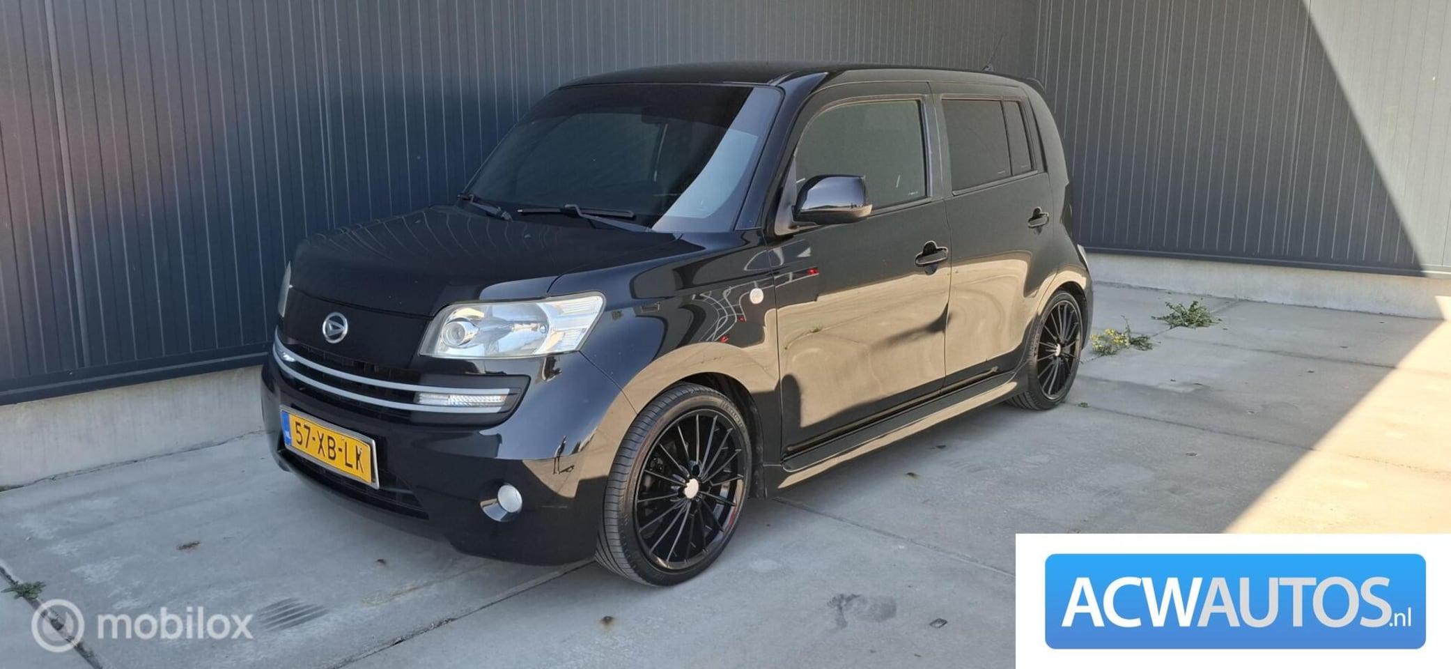 Daihatsu Materia - 1.3 Funk black sport - AutoWereld.nl