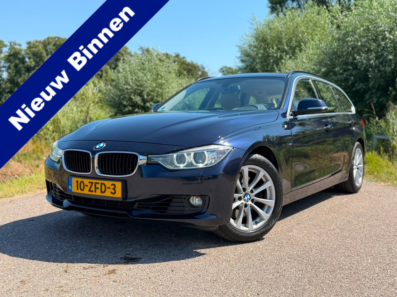 BMW 3-serie Touring - 328i Upgrade Edition / Automaat / Airco / Navi / Leder Interieur / Elektrische Achterklep - AutoWereld.nl