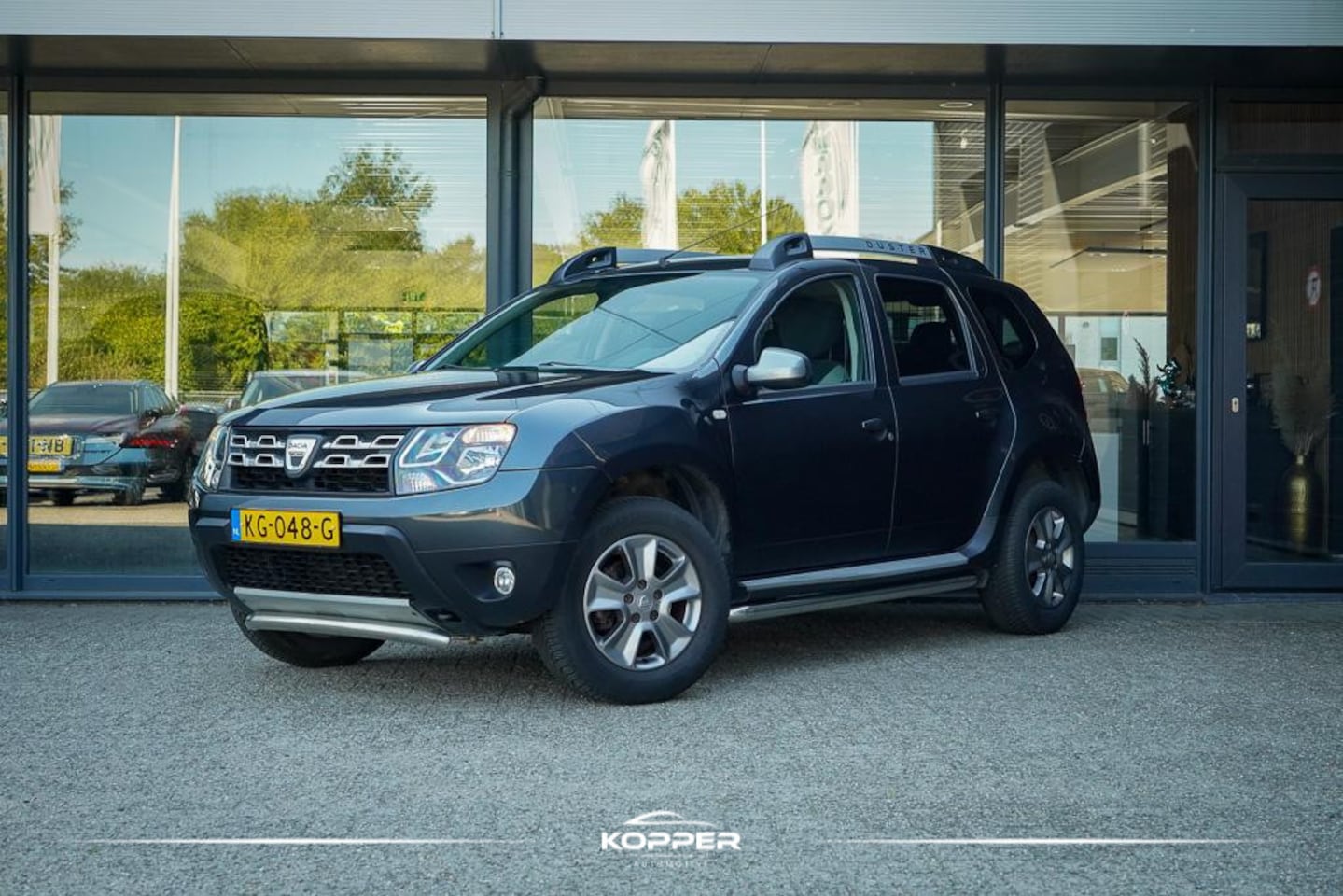 Dacia Duster - 1.2 TCe 4x2 Lauréate / Navi / Airco / Trekhaak - AutoWereld.nl