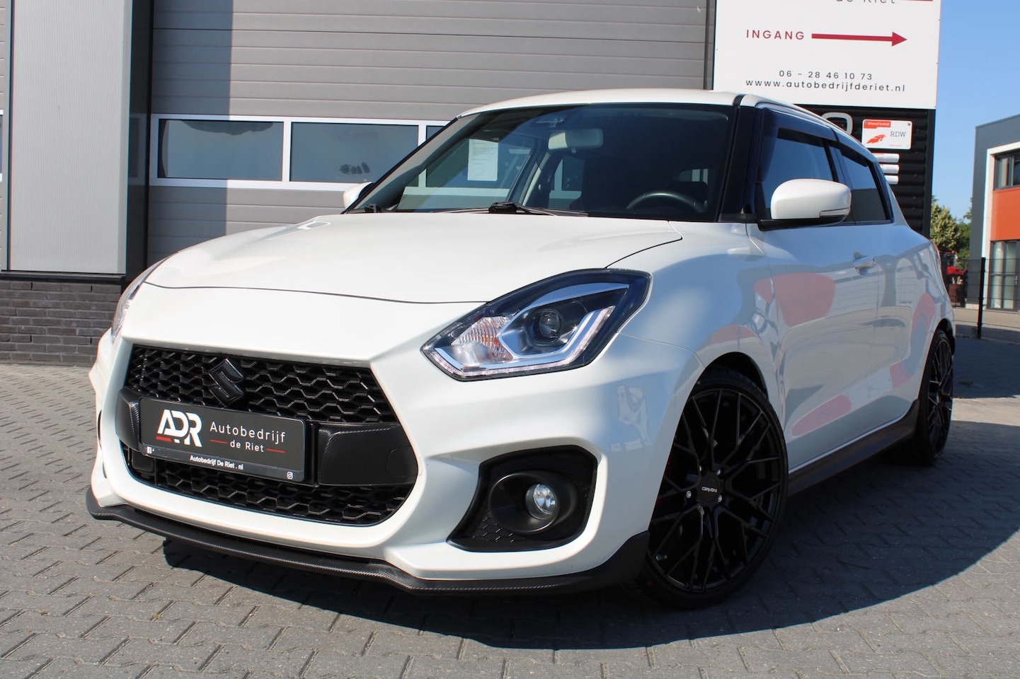Suzuki Swift - 1.4 SPORT|MAXTON|18''LM|CRUISE|ACC|NAVI|LED|CARBON|BOMVOLL - AutoWereld.nl