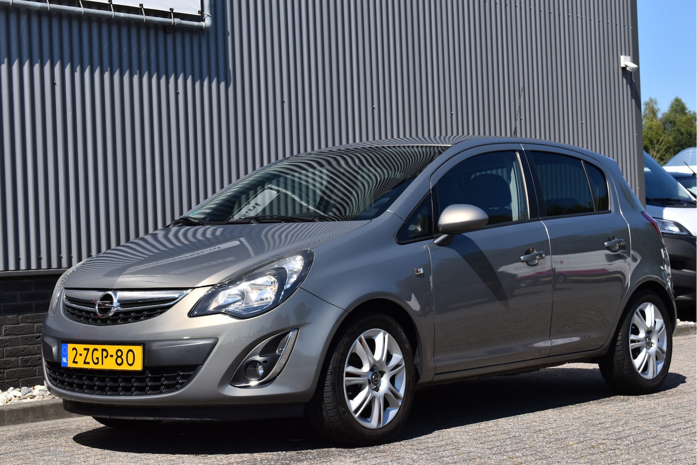 Opel Corsa - 1.2-16V BlitZ Stoel/stuurverwarming, Cruise control, NL-auto, PDC - AutoWereld.nl