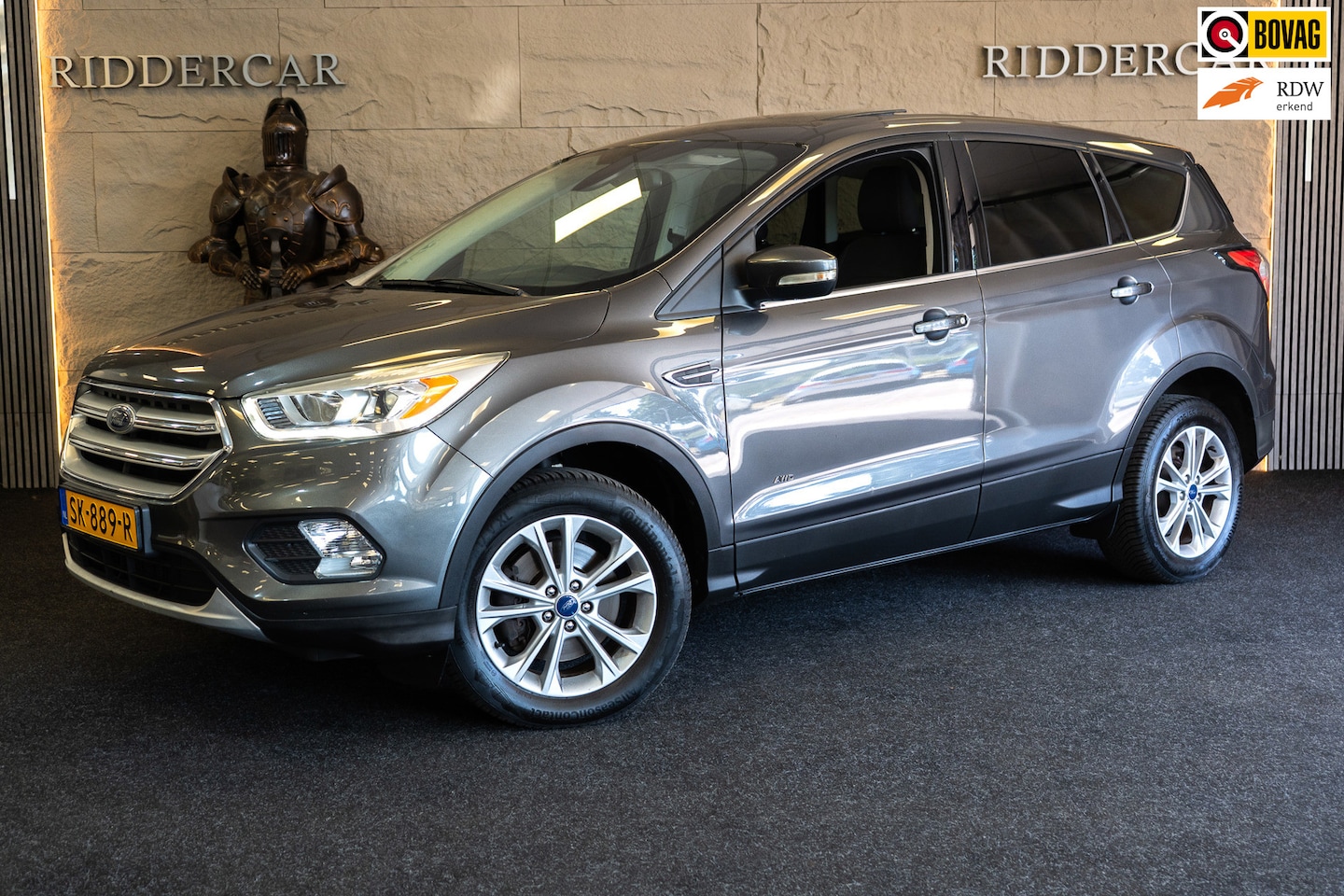 Ford Kuga - 1.5 Titanium 4WD|GARANTIE|AUTOMAAT|PANO|CRUISE|AIRCO|PARK SENS ACHTER| - AutoWereld.nl