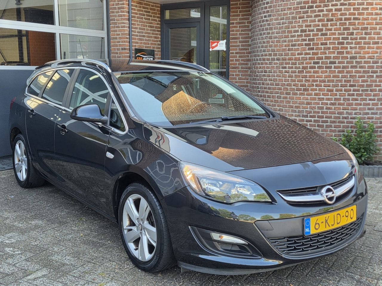 Opel Astra Sports Tourer - 1.4 Turbo Business + | Airco | Cruise | Trekhaak | Lm velgen - AutoWereld.nl
