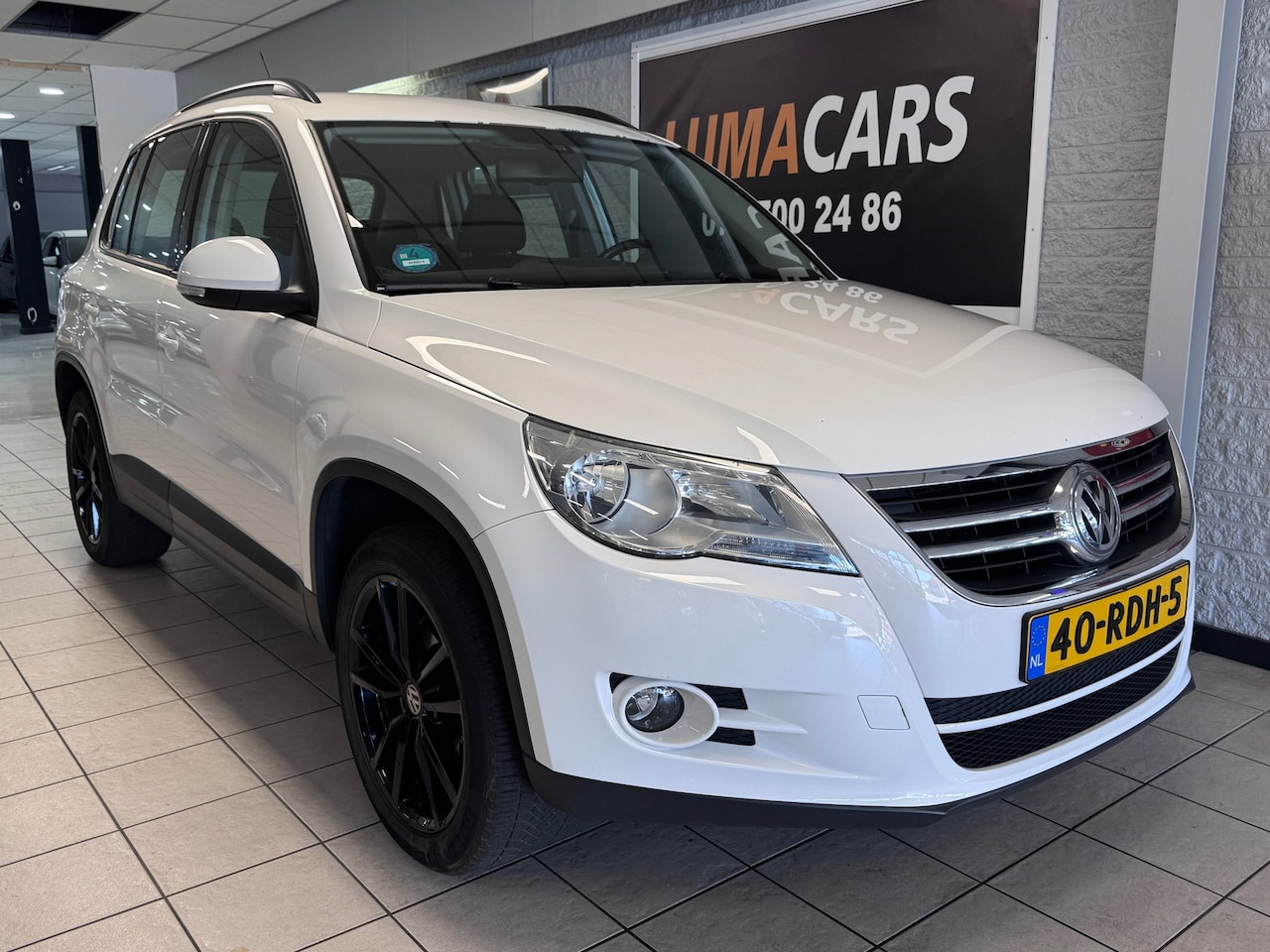 Volkswagen Tiguan - 1.4 TSI Comfort&Design| Nieuwe APK |Camera - AutoWereld.nl