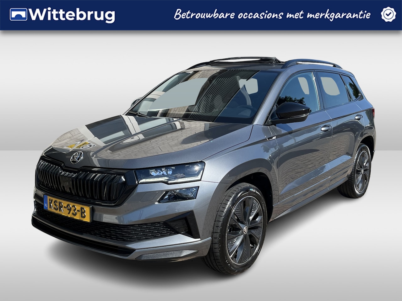 Skoda Karoq - 1.5 TSI ACT Sportline Business / AUTOMAAT/ PANO/ DIGITAL DASH/ KEYLESS/ SMARTLINK/ PARK. S - AutoWereld.nl